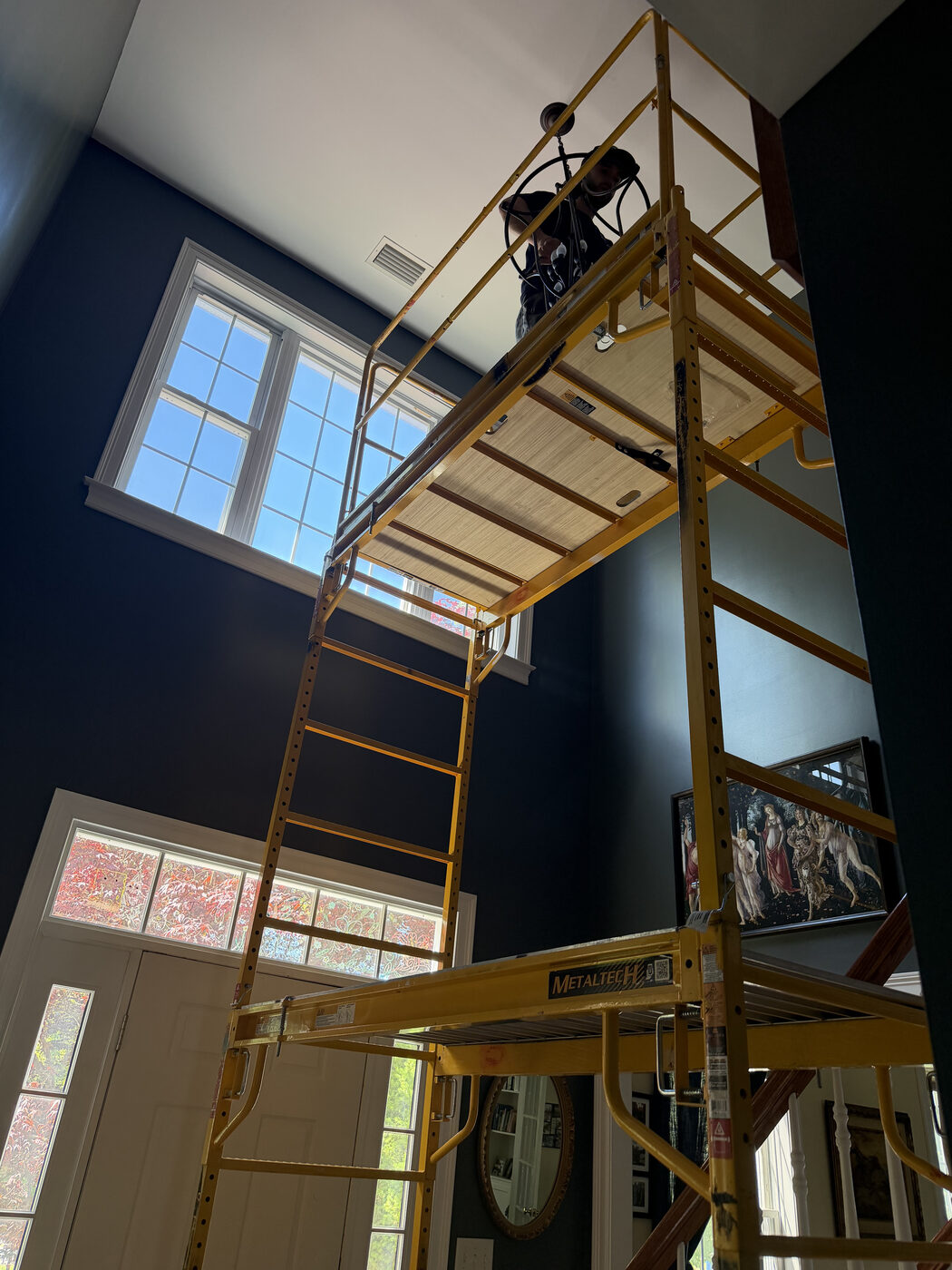 TJF Electric crew on scaffolding — CT project
